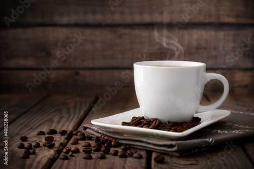 Coffee espresso with roasted coffee beans isolated on background.