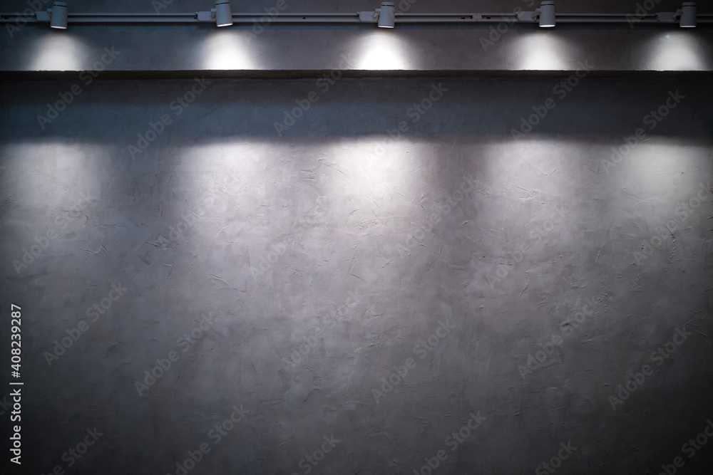 empty Cement wall in dark with ray light from the lamp. Use for abstract background texture banner building room empty Cement wall in dark with ray light from the lamp. Use for abstract background texture banner building room