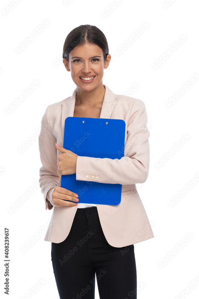 beautiful young businesswoman in pink jacket holding clipboard beautiful young businesswoman in pink jacket holding clipboard