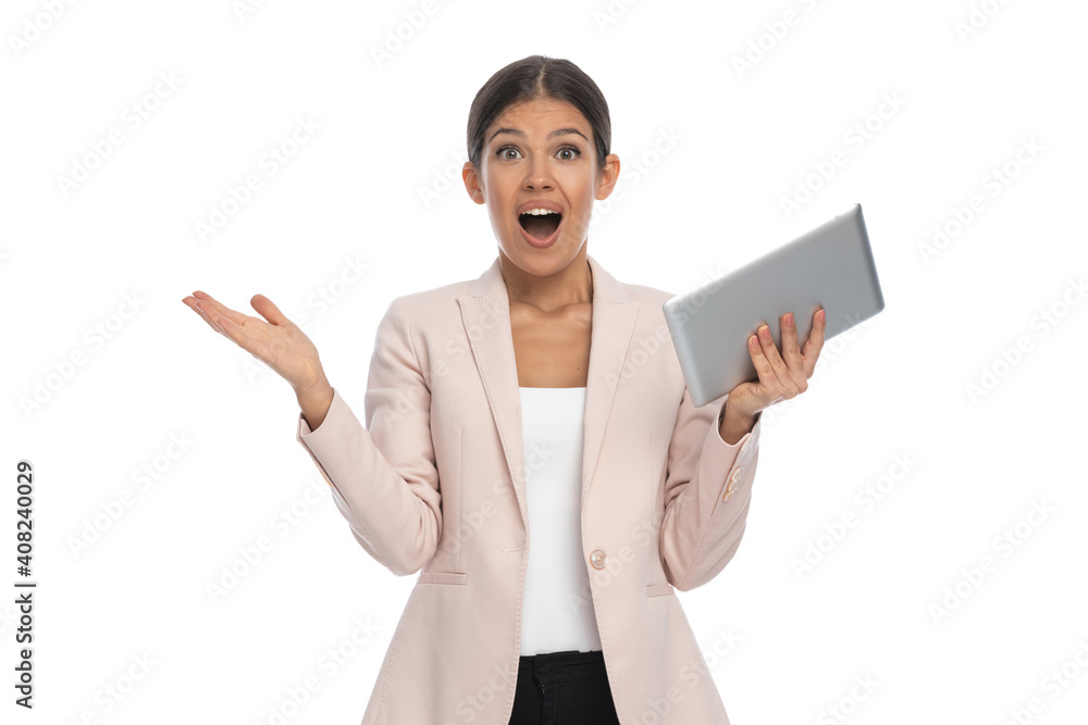 attractive amazed woman in pink jacket making a shocked face attractive amazed woman in pink jacket making a shocked face