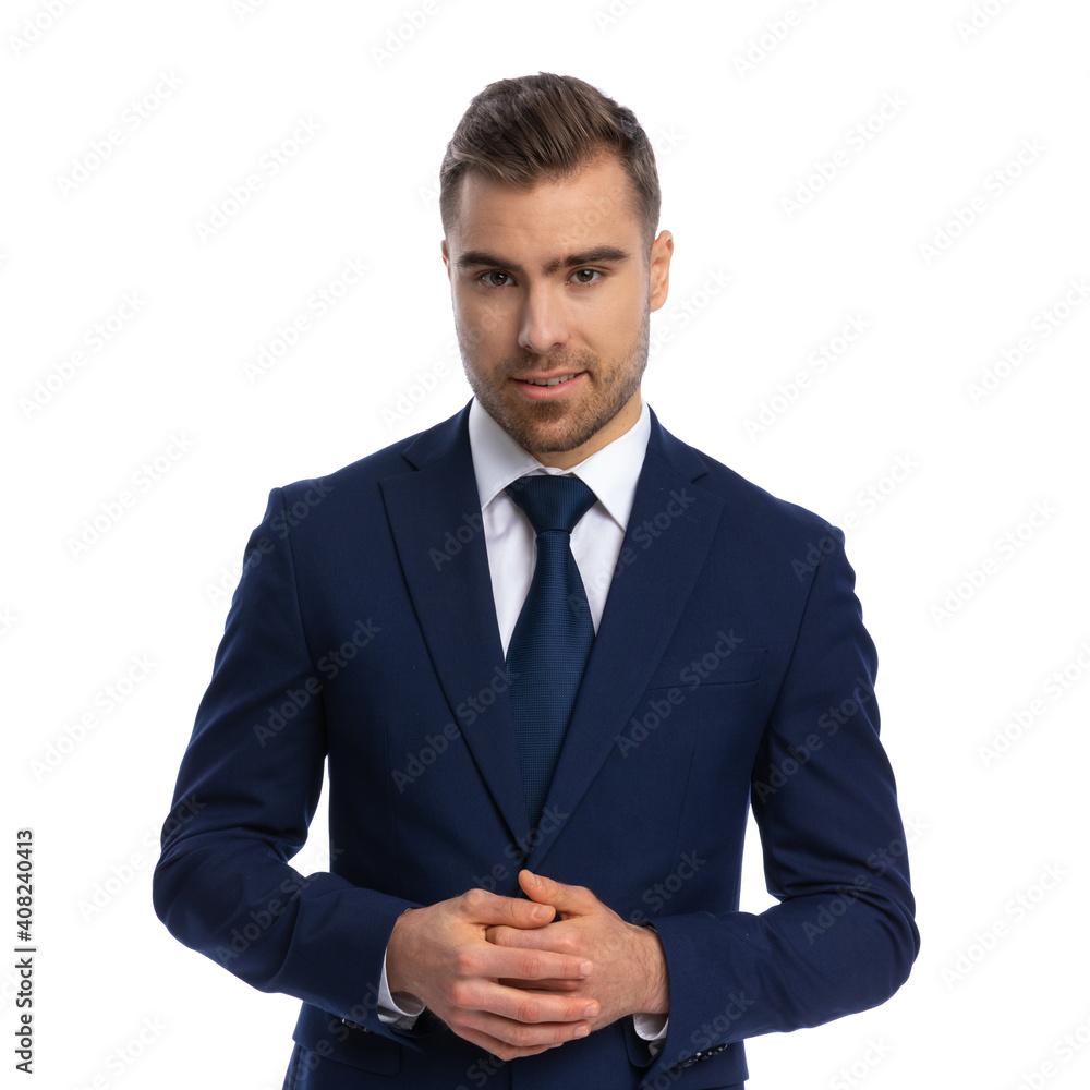 sexy elegant guy in suit touching fingers and posing sexy elegant guy in suit touching fingers and posing