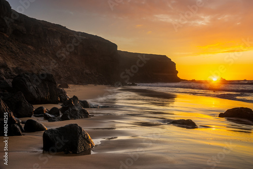 Spectacular sunset over the rocky cliffs of Fuerteventura