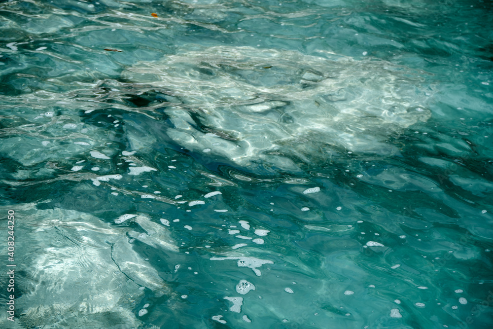 Fototapeta premium Turquoise colors crystal clear sea water background