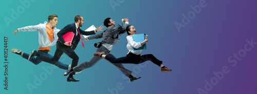 Evening. Happy office workers jumping and dancing in casual clothes or suit isolated on gradient neon fluid background. Business, start-up, working open-space, motion, action concept. Creative collage photo