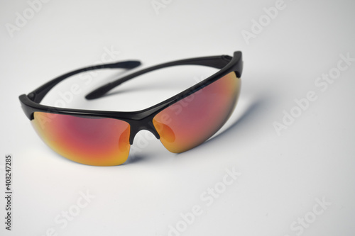 Sports sunglasses close-up on white background