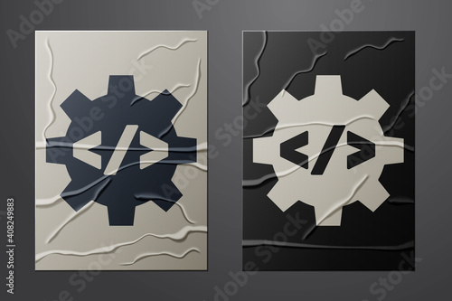 White Web design and front end development icon isolated on crumpled paper background. Paper art style. Vector.
