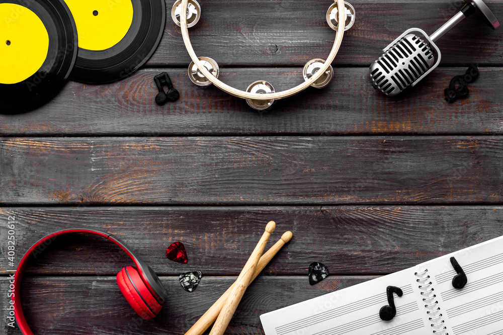 Fototapeta premium Music flat lay - instruments with vinyl records, overhead view