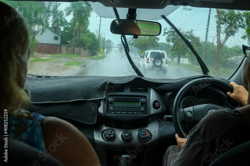 Driving in the rain in Darwin, Australia © Regis