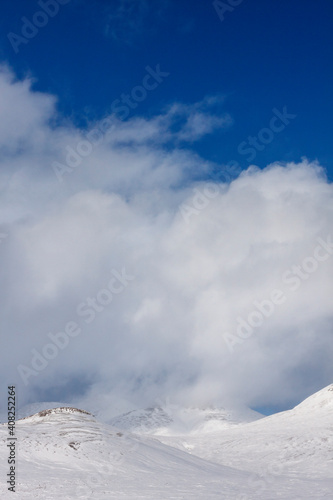 snow covered mountains © Mateusz Liberra