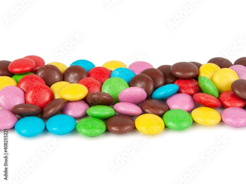 chocolate dragee in multicolor glaze isolated on the white background