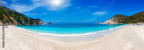 Panoramic view of the beautiful Petani beach with turquoise sea and fine pebble sand on the Ionian island of Kefalonia, Greece