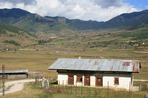building (house ?) in a village in the phojika valley in bhutan photo