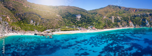 Panoramic view of the popular Petani Beach, Kefalonia Island, Greece, with turquoise sea and sunshine in summer time