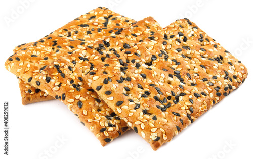 Crispy cookies with black and white sesame are isolated on a white background.