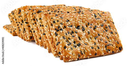 A stack of cookies with black and white sesame is isolated on a white background.