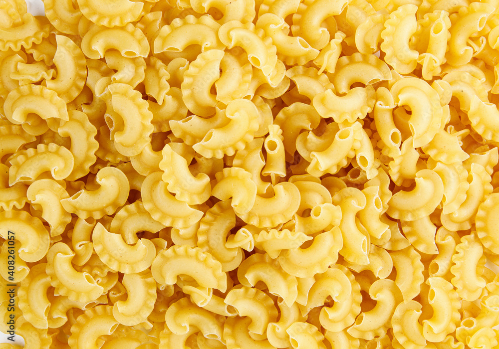 Pasta background. The pasta is filled with an even layer. Pasta background. The pasta is filled with an even layer.