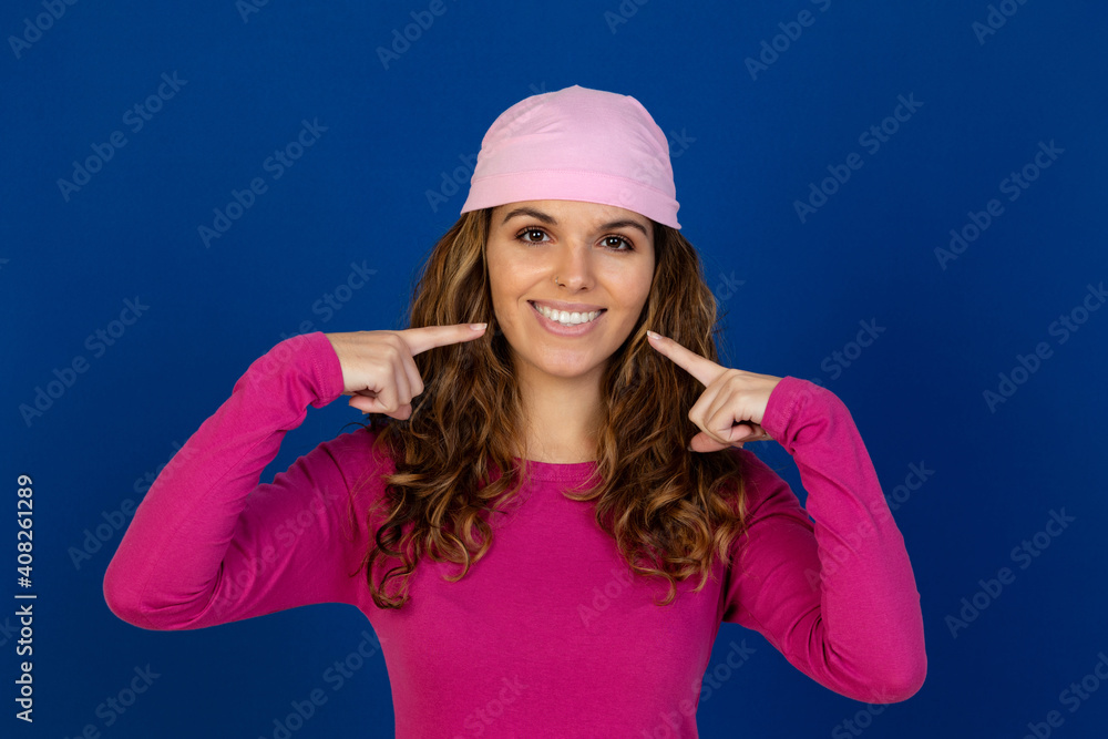 Hopeful woman wearing a pink scarf Hopeful woman wearing a pink scarf