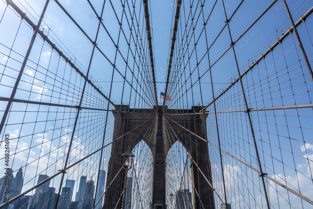 Fototapeta premium Brooklyn Bridge in New York City with complex cables installed
