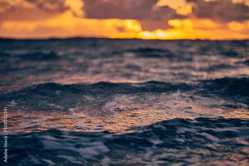 ocean waves with a sunset