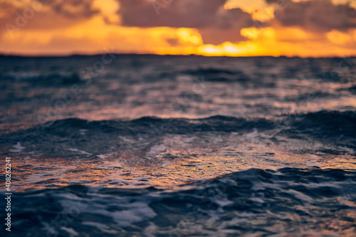 ocean waves with a sunset