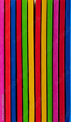 Multicolor stripes. The colors of the rainbow are blue, red, pink, green, yellow. Background, textura, wallpaper.