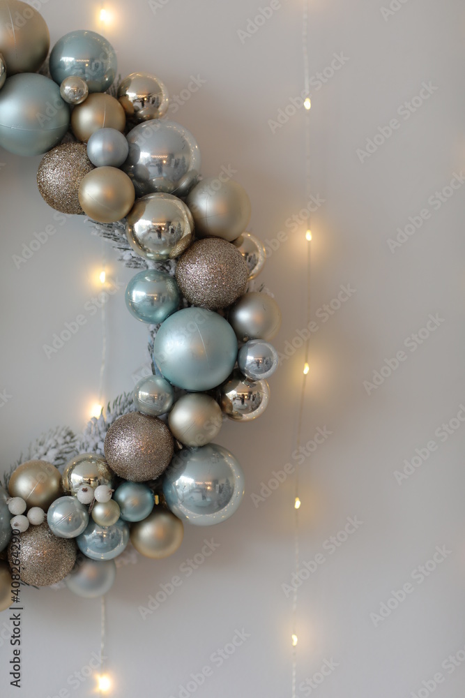 Christmas wreath of blue and white balls on wooden white surface. Top view, horizontal. For background or greeting card. Christmas wreath of blue and white balls on wooden white surface. Top view, horizontal. For background or greeting card.