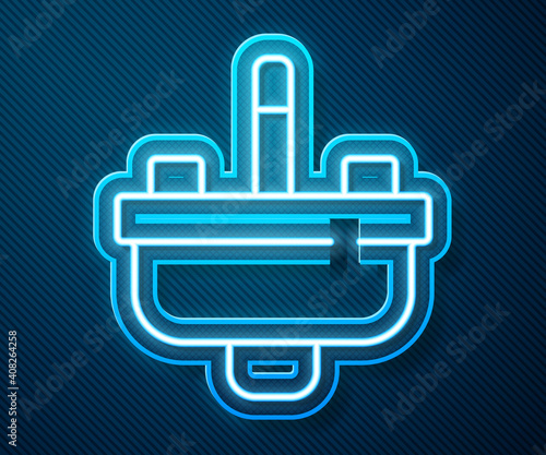 Glowing neon line Washbasin with water tap icon isolated on blue background. Vector.