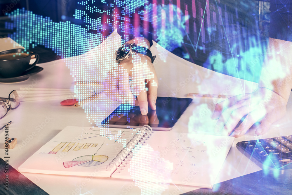 Double exposure of man's hands holding and using a digital device and forex graph drawing. Financial market concept. Double exposure of man's hands holding and using a digital device and forex graph drawing. Financial market concept.