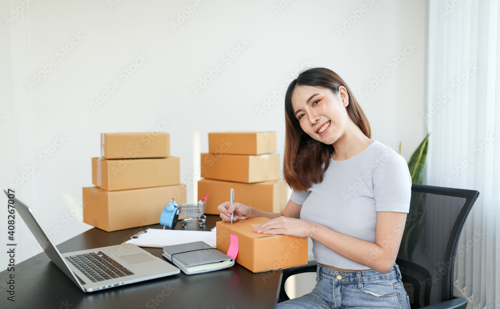 Startup small businessnworking with computer at workplace. Freelance woman seller check product order.market place.Online selling.Online Shopping. SME,E-commerce. Startup small businessnworking with computer at workplace. Freelance woman seller check product order.market place.Online selling.Online Shopping. SME,E-commerce.