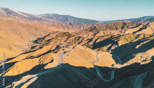 Amazing panoramic view of a serpentine road crossing the Atlas Mountains in Morocco