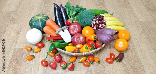 Fototapeta Naklejka Na Ścianę i Meble -  fruits and vegetables on a board