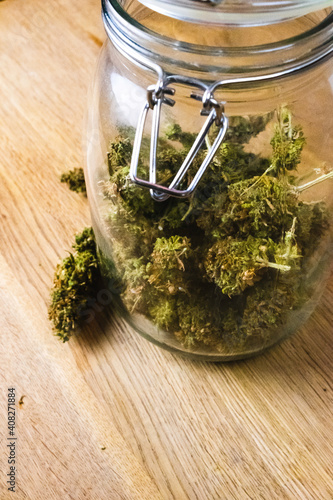 Cannabis inside of a mason jar.