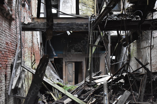 Collapsed abandoned building interior structure with timber doors floors and walls in ruin Brownsville Pennsylvania