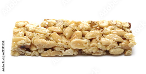 Honey granola nut bar with almonds, peanuts, walnuts and honey isolated on white background