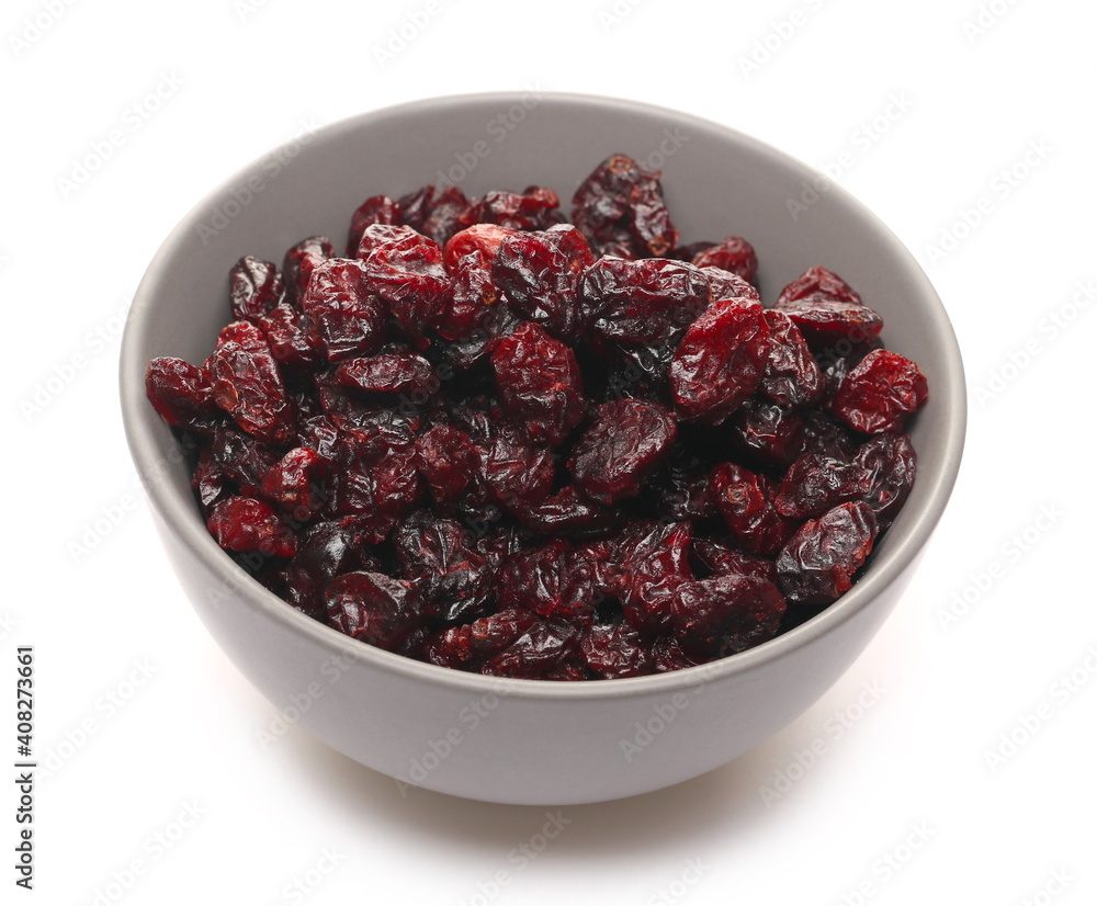 Dried cranberries in bowl isolated on white background Dried cranberries in bowl isolated on white background