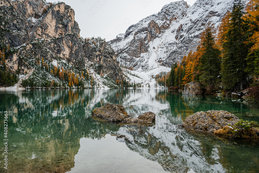winter landscape, with kaleidoscope effect on the side di braies located in the Italian alps in the area of ​​the dolomites. Snow, trees and mountains

