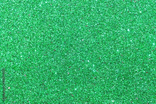 Green glitter foamiran paper texture background wallpaper.
