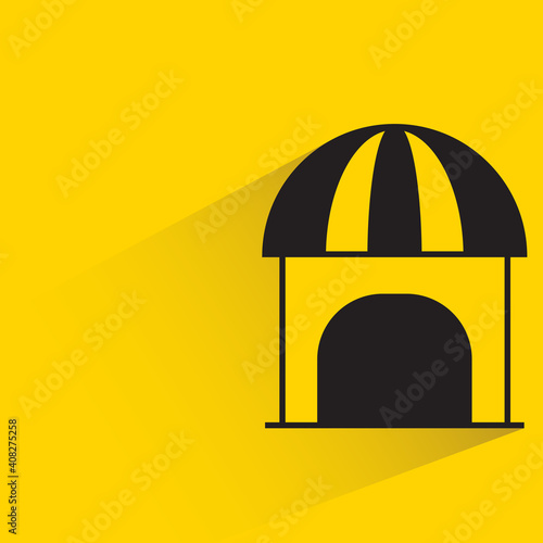 hut with drop shadow on yellow background