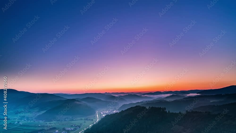 Time-lapse of misty mountain scene at sunrise Time-lapse of misty mountain scene at sunrise