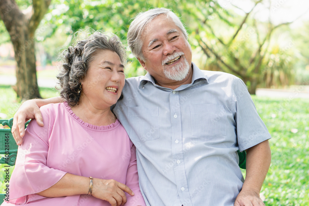 Happy elderly couple with lifestyle after retiree concept. Lovely asian seniors couple embracing together in the park in the morning. Happy elderly couple with lifestyle after retiree concept. Lovely asian seniors couple embracing together in the park in the morning.