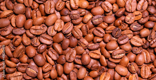 Roasted arabica coffee bean full frame backdrop background texture