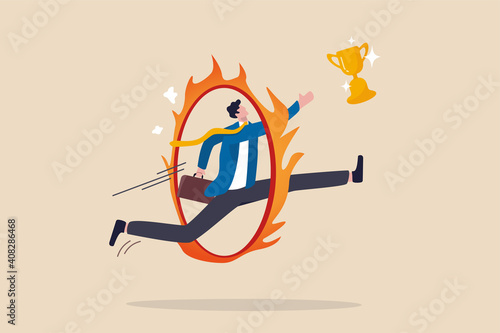 Business challenge, obstacle, risk or danger to overcome to become success, achievement or reward for work effort concept, skillful businessman jump over fiery burning hoops to catch winning trophy.