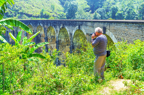 Making pictures of Nine Arch Bridge, Damodara, Sri Lanka photo