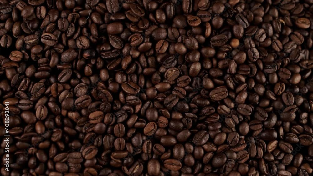 a fresh roasted coffee beans on the table a fresh roasted coffee beans on the table