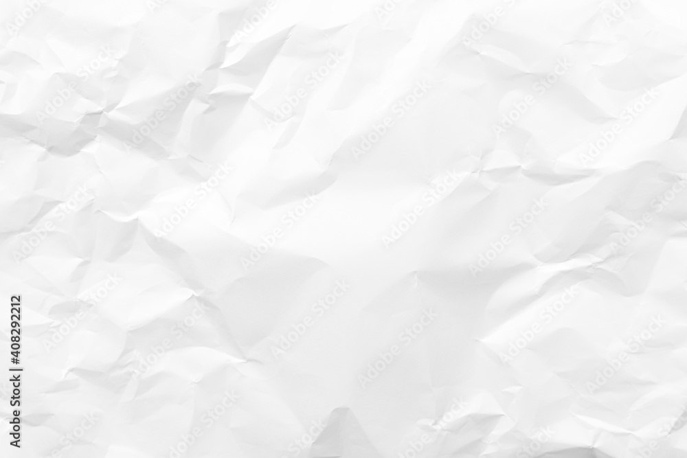 White crumpled paper texture background. Clean white paper. Top view. White crumpled paper texture background. Clean white paper. Top view.