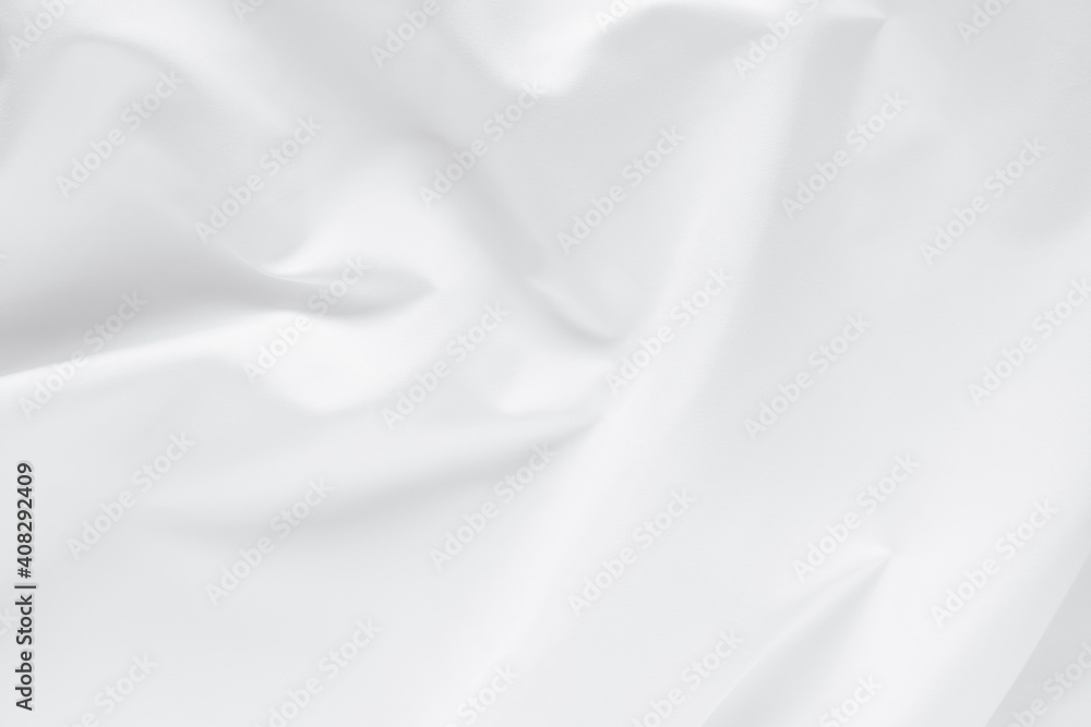 Obraz premium Abstract white fabric texture background. Cloth soft wave. Creases of satin. silk and cotton.