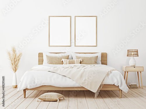 Vertical frame mockup in boho bedroom interior with wooden bed, beige fringed blanket, cushion with tassels, dried pampas grass and wicker lamp on white wall background. 3d rendering, 3d illustration