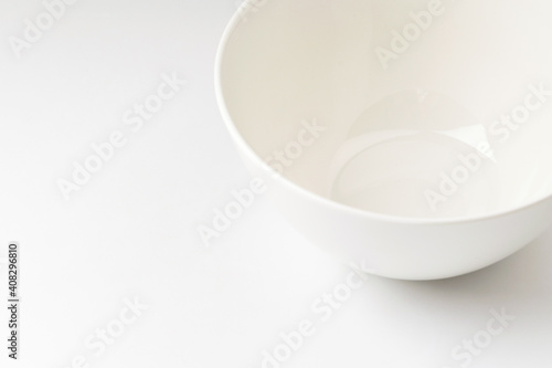 Porcelain bowl on white background