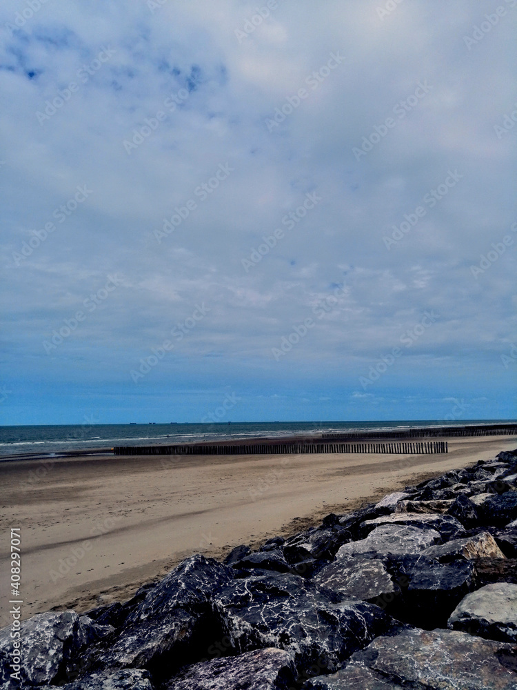 
wide strip of beach and sea