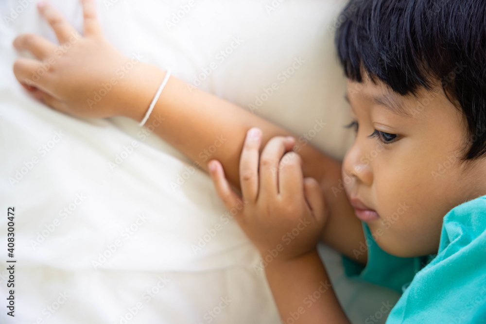 Authentic close up of happy kid in a bed. Concept of new generation, family, parenthood, authenticity, Son. Authentic close up of happy kid in a bed. Concept of new generation, family, parenthood, authenticity, Son.